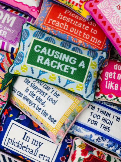 Causing A Racket Needlepoint Pillow