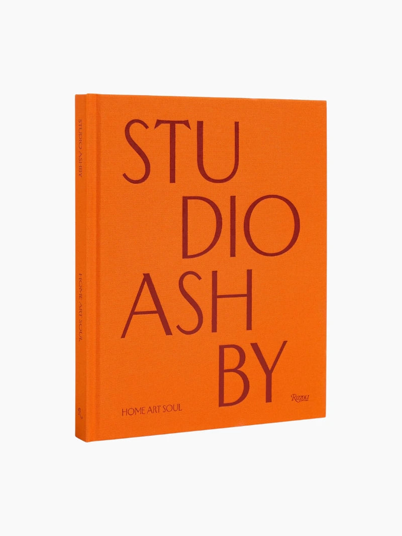 The Orange Coffee Table Book Stack
