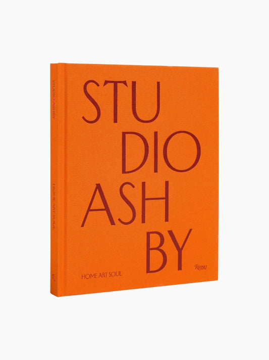 The Orange Coffee Table Book Stack