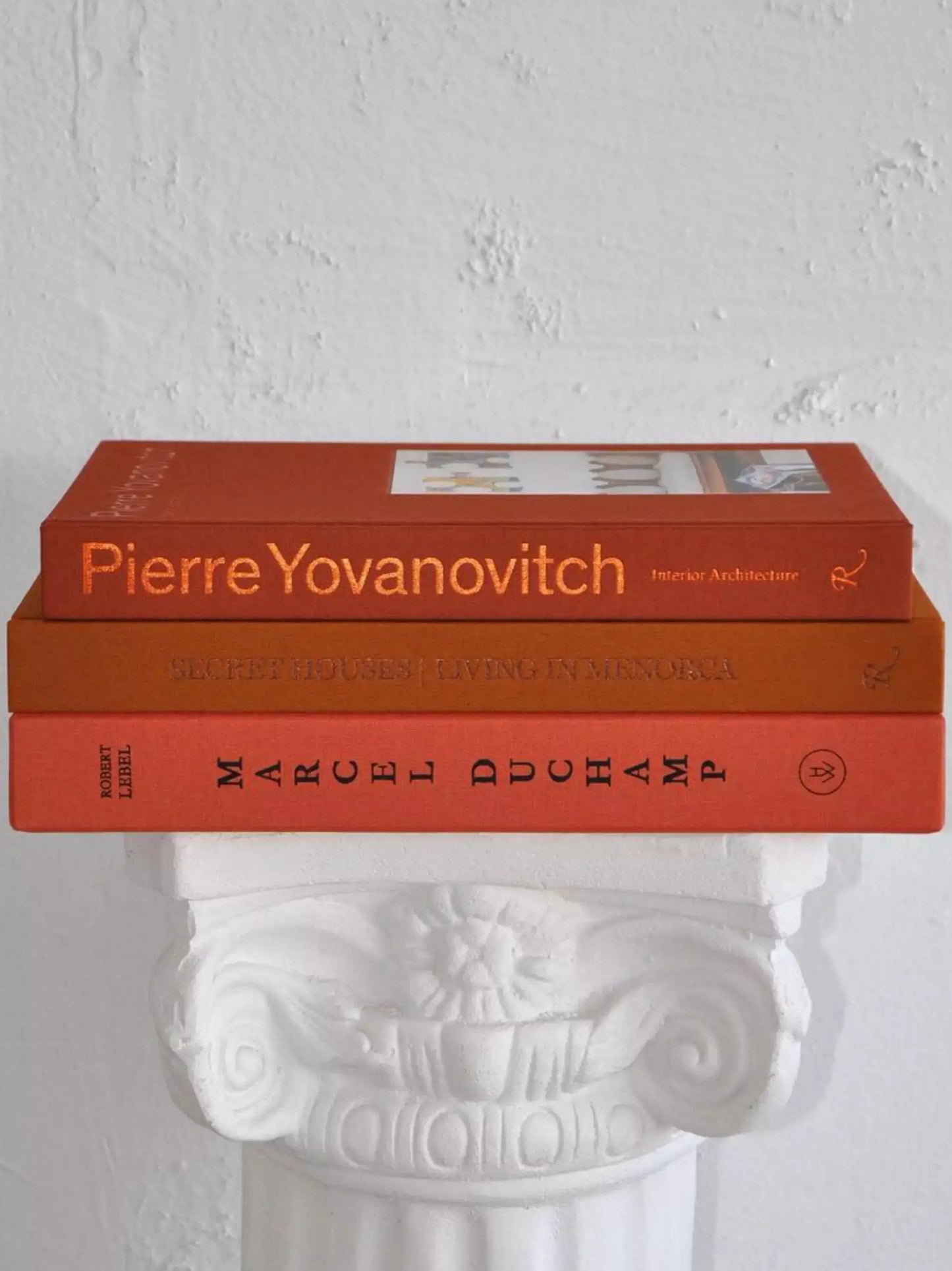 The Orange Coffee Table Book Stack