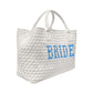Blue bride embroidered handbag by Lilly Loves, featuring intricate embroidery and elegant design, shown from a side view.